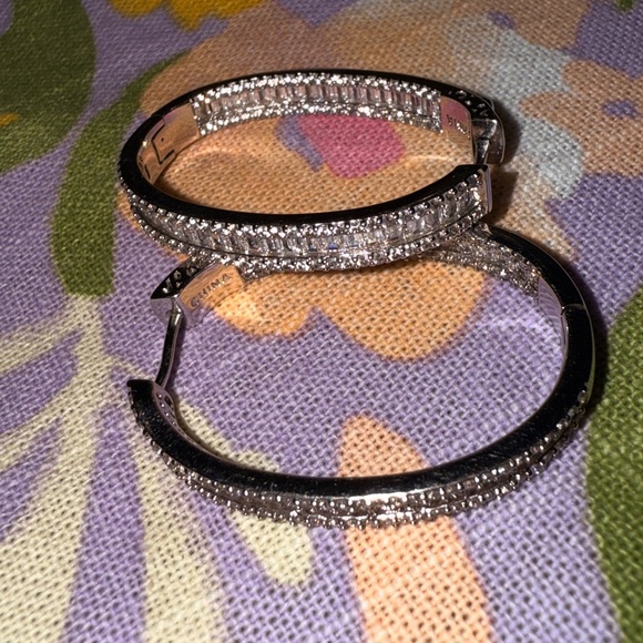 Elegant – These sparkling hoop earrings have a refined and sophisticated look. - Picture 12 of 14